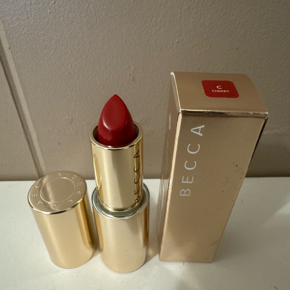 BECCA Cherry Lipstick in Gold Case
